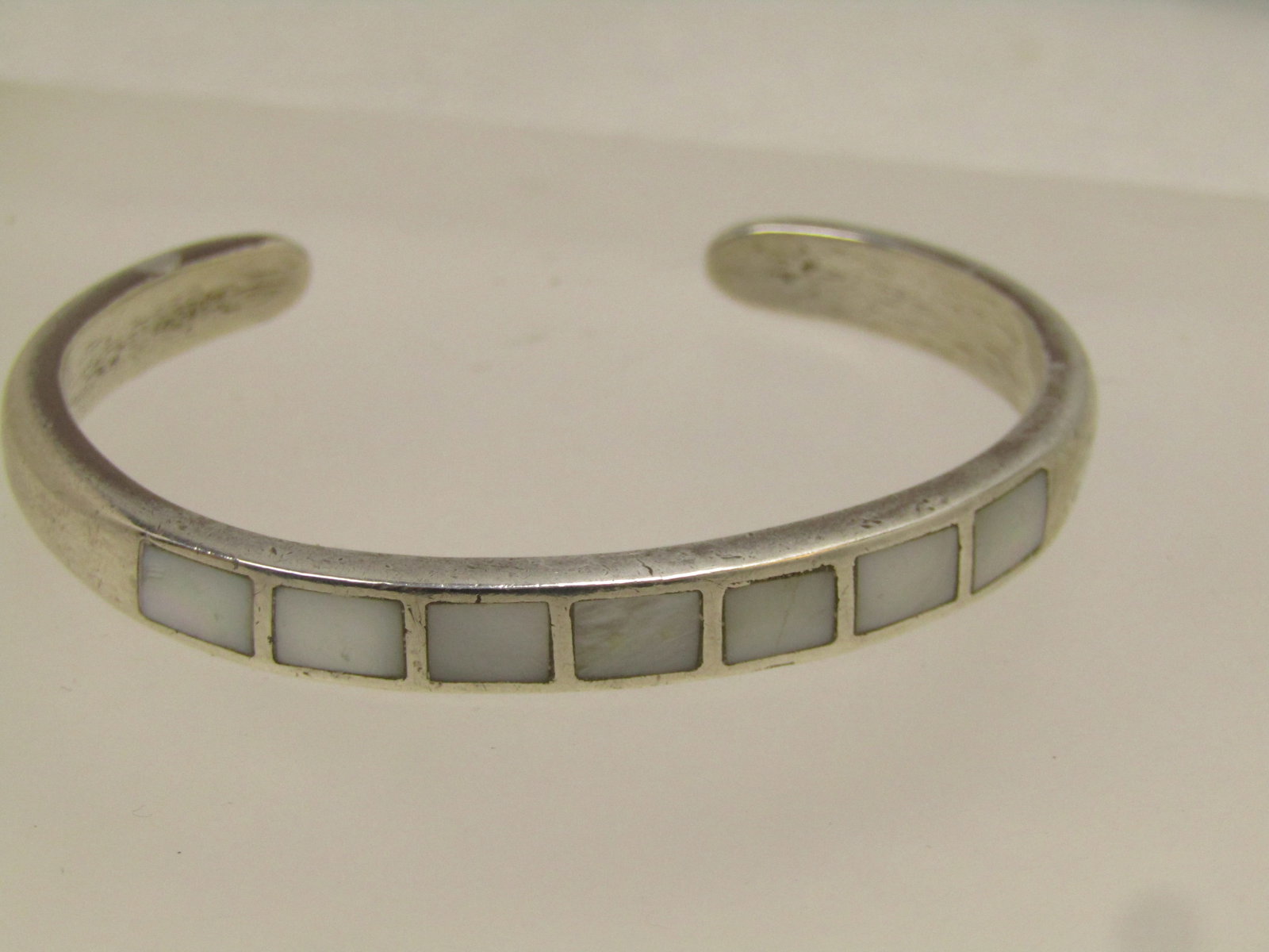 Vintage Sterling Inlaid Mother-of-Pearl Bracelet, Southwestern, 6", 1960's-1970's: Title: Vintage Sterling Inlaid Mother-of-Pearl Bracelet, Southwestern, 6", 1960's-1970's Description: Vintage Sterling Inlaid Mother-of-Pearl Bracelet, Southwestern, 6", 1960's-1970's Exact age is