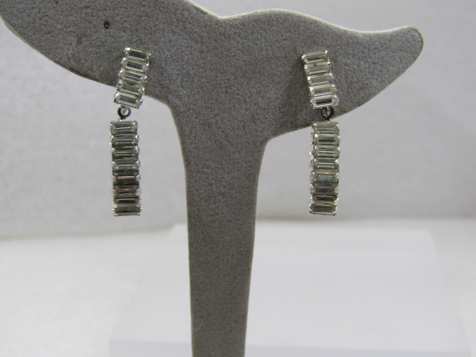 Vintage Rhinestone Baguette Clip Earrings, Stud & Drop Hoop, 1.25" long.: Title: Vintage Rhinestone Baguette Clip Earrings, Stud & Drop Hoop, 1.25" long. Description: Vintage Rhinestone Baguette Clip earrings, Stud & Drop Hoop, 1.25" long. This has clear baguettes set on
