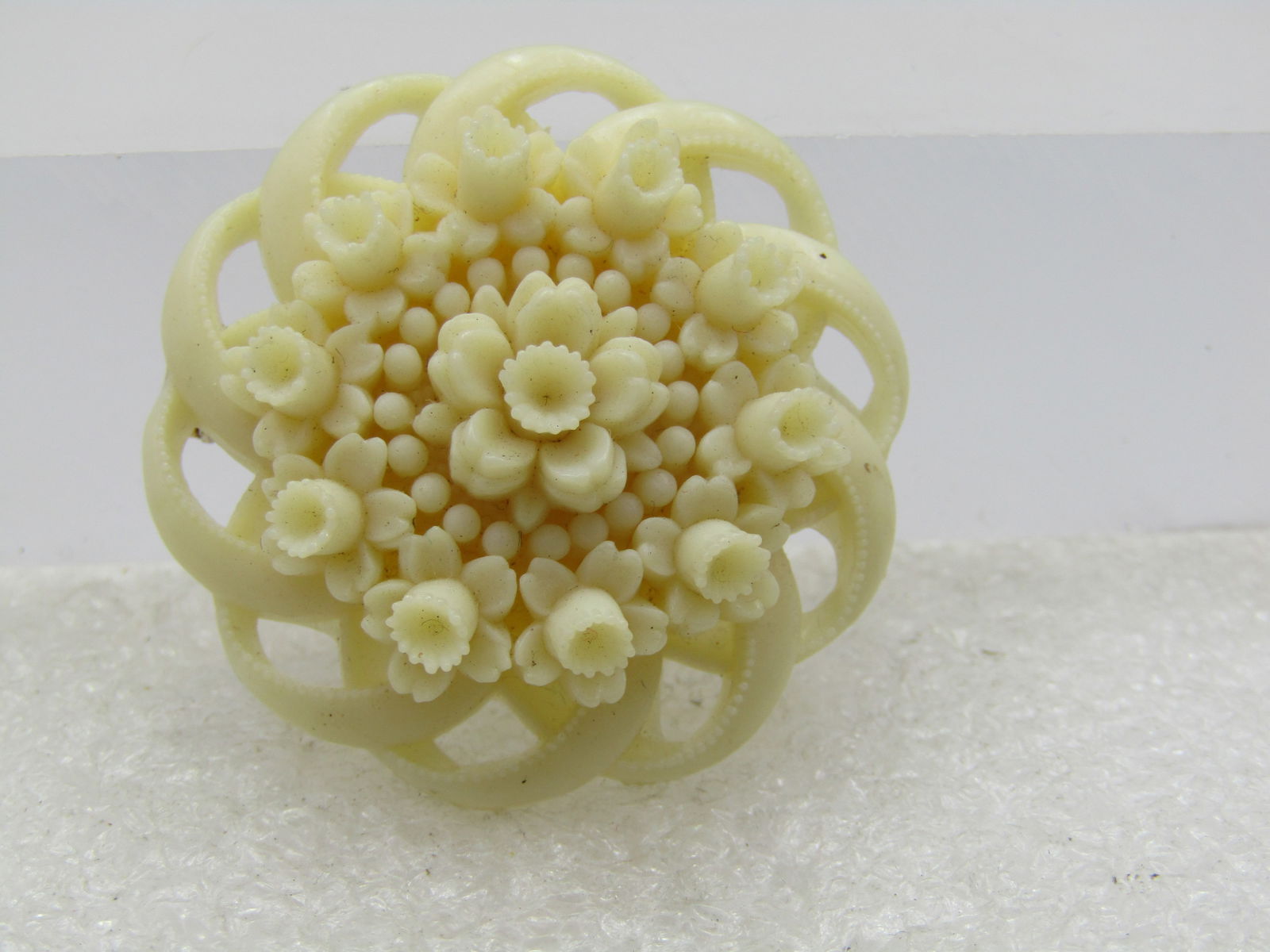 Vintage White Celluloid Spiral Floral Brooch, 1.5", 1950's-1960's: Title: Vintage White Celluloid Spiral Floral Brooch, 1.5", 1950's-1960's Description: Vintage White Celluloid Spiral Floral Brooch, 1.5", 1950's-1960's. Rose blossom in the center with filgiree