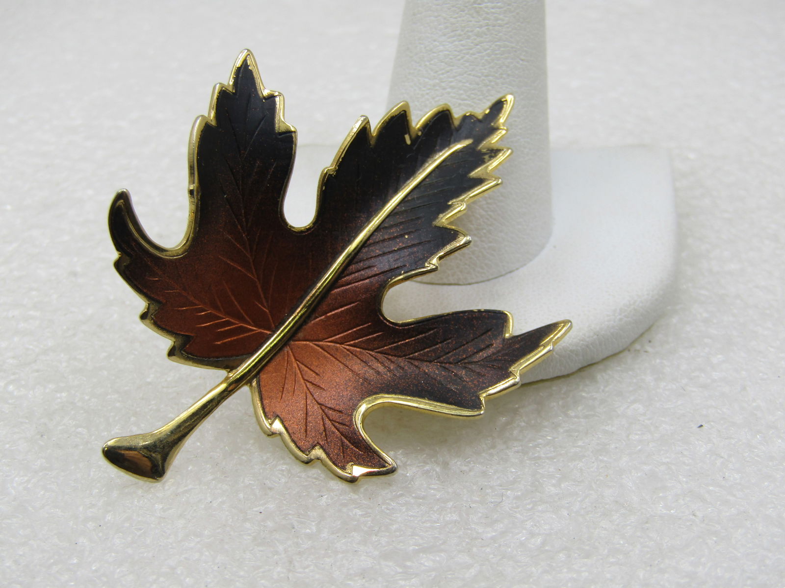 Vintage Enameled Black and Copper Leaf Brooch, 1960's, 2.5": Title: Vintage Enameled Black and Copper Leaf Brooch, 1960's, 2.5" Description: Vintage Enameled Black and Copper Leaf Brooch, 1960's, 2.5" tall and 1.75" wide. Gold tone stem and edges of the brooch