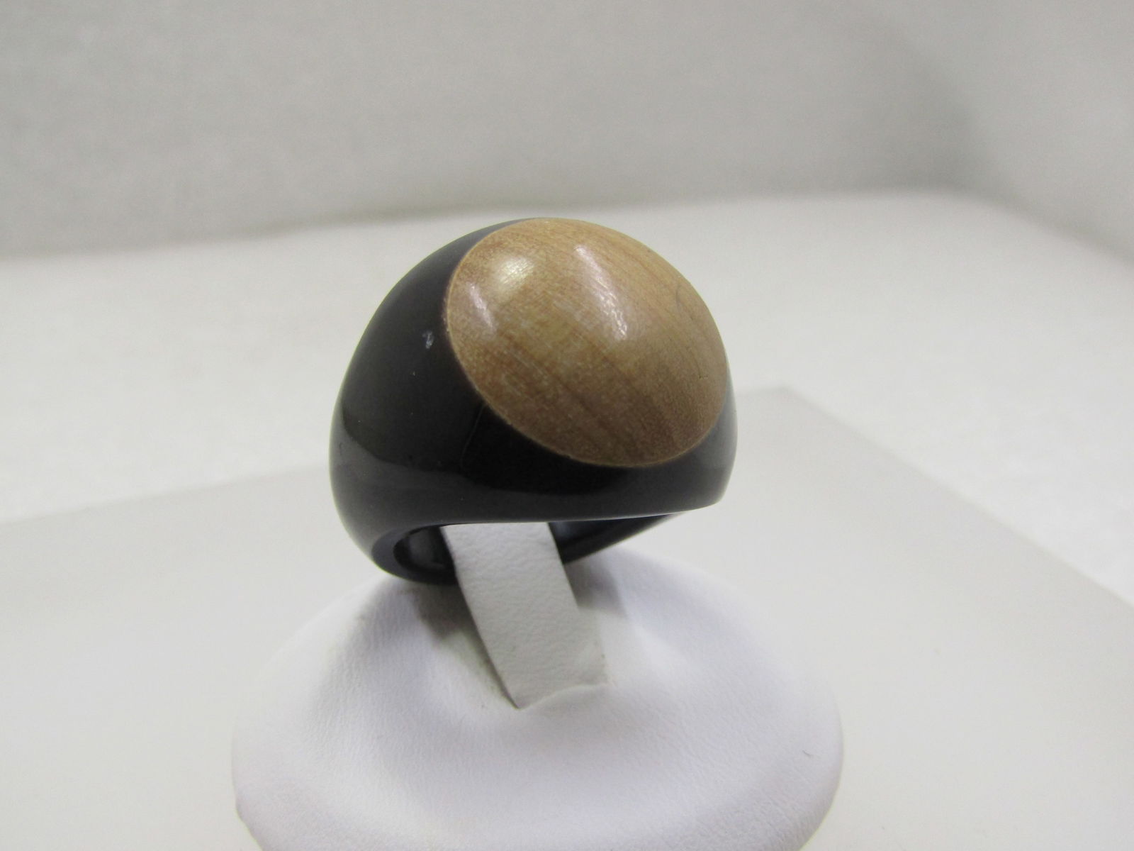 Wood Inlaid Black Molded Signet Ring, Sz. 7.5: Title: Wood Inlaid Black Molded Signet Ring, Sz. 7.5 Description: Wood Inlaid Black Molded Ring, Sz. 7.5, Similar to a Prison Ring. This has an inlaid finished domed 17mm circle of natural wood with