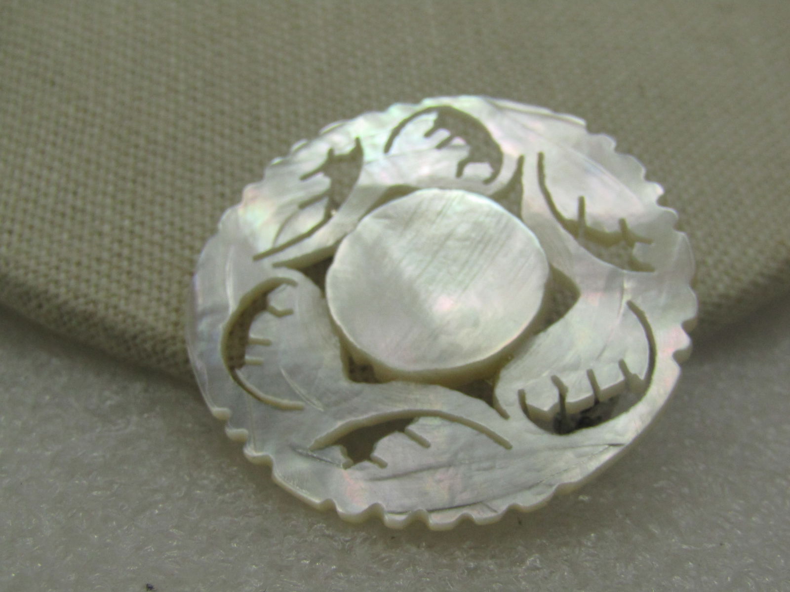 Vintage Carved Mother-of-Pearl Floral Brooch, Signed Bethlehem: Title: Vintage Carved Mother-of-Pearl Floral Brooch, Signed Bethlehem Description: Vintage Carved Mother-of-Pearl Floral Brooch, Signed Bethlehem. A couvenir brooch from Bethlehem - floral, leaf