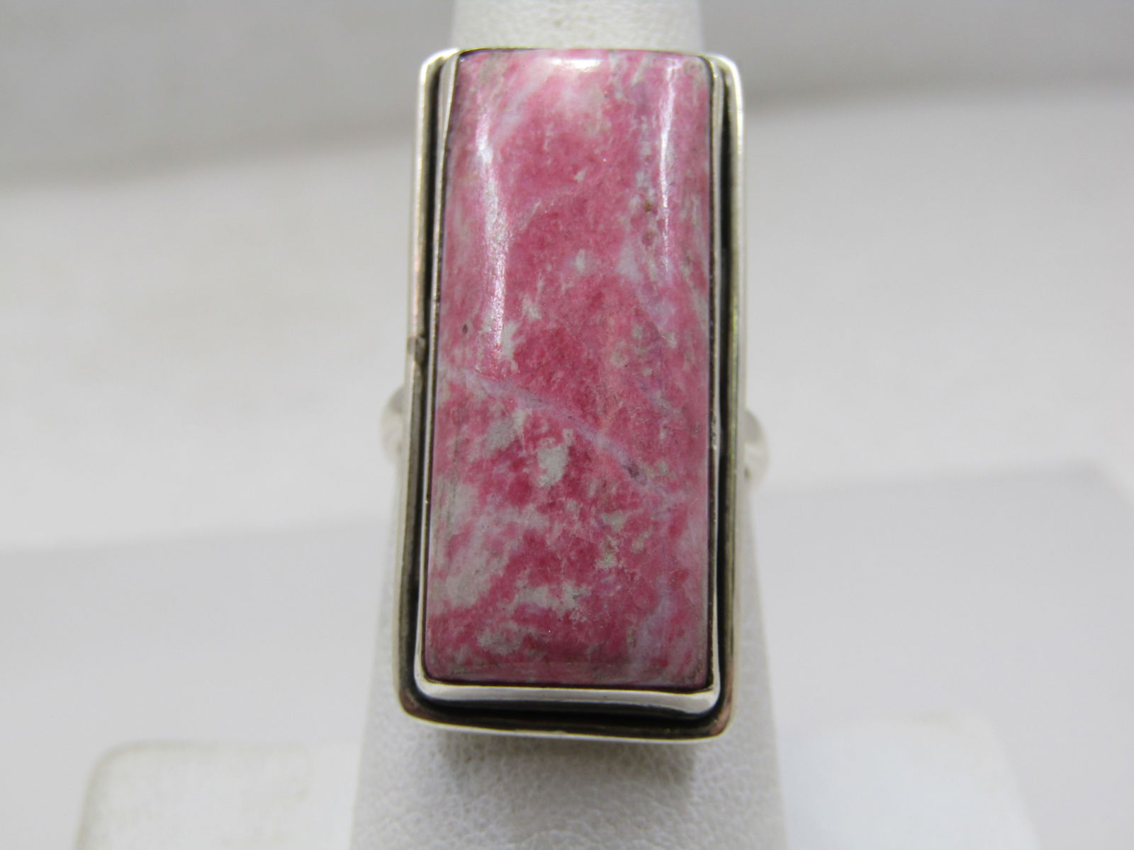Vintage Sterling Southwestern Rhodocrosite Ring, Rectangular, Sz. 7.25: Title: Vintage Sterling Southwestern Rhodocrosite Ring, Rectangular, Sz. 7.25 Description: Vintage Sterling Southwestern Rhodocrosite Ring, Rectangular, Sz. 7.25. This is a long stone down the