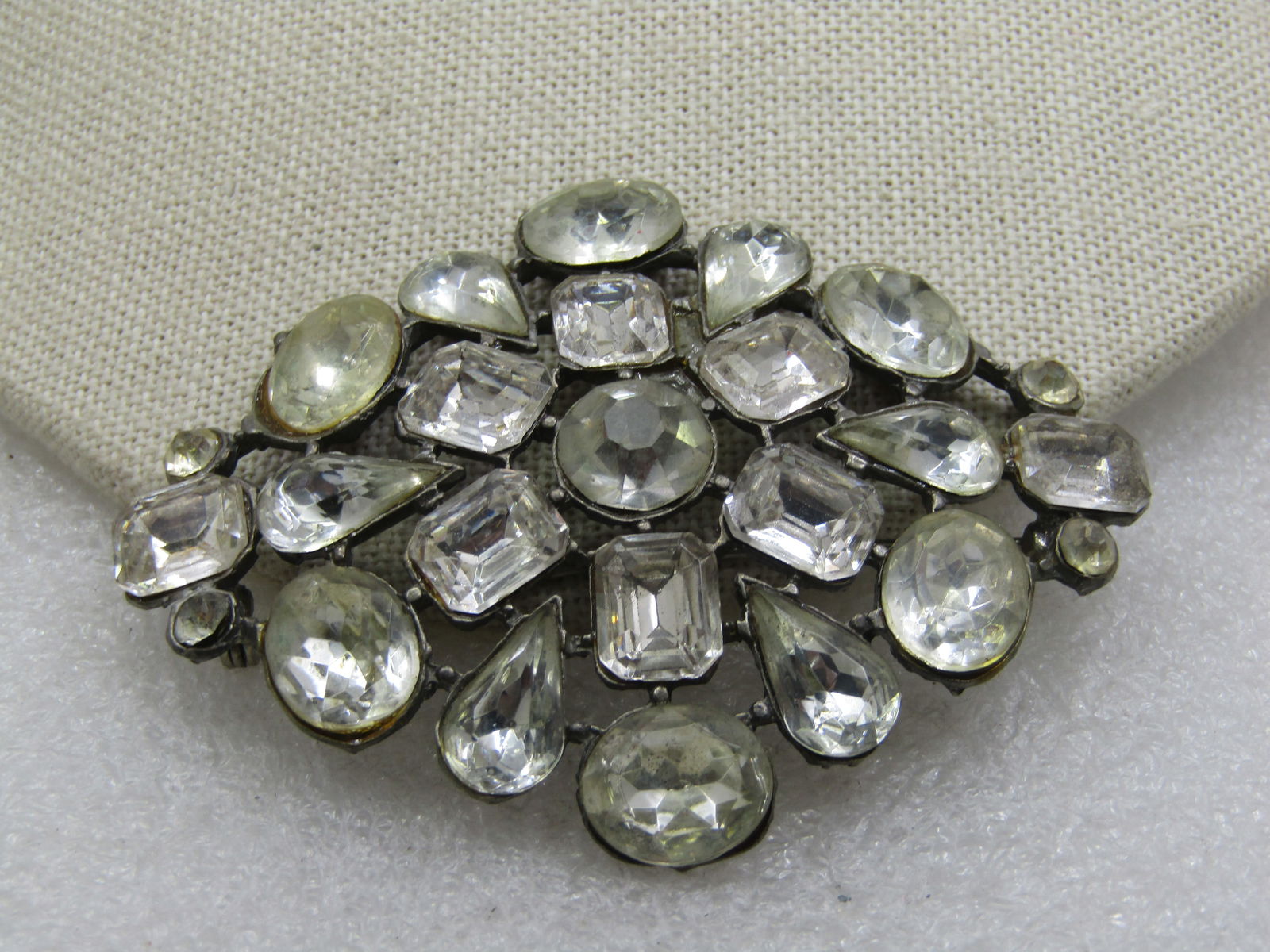 Vintage Clear Rhinestone Brooch, 1920's, 3" by 2.25": Title: Vintage Clear Rhinestone Brooch, 1920's, 3" by 2.25" Description: Vintage Clear Rhinestone Brooch, 1920's, 3" by 2.25" with large clear glass rhienstoens that are appx. 11mm to 12mm and in a va