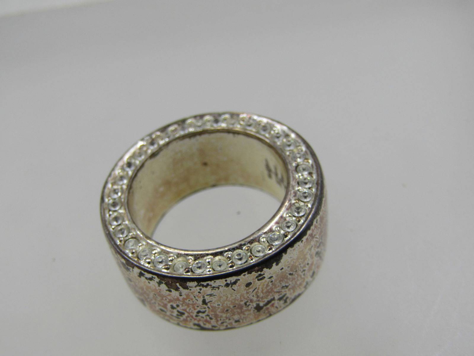 Vintage Wide Clear Rhinestone Band Ring, Nine West, Sz. 6, 10mm: Title: Vintage Wide Clear Rhinestone Band Ring, Nine West, Sz. 6, 10mm Description: Vintage Wide Clear Rhinestone Band Ring, Nine West, Sz. 6, 10mm. There are clear rhinestones on the edge of the