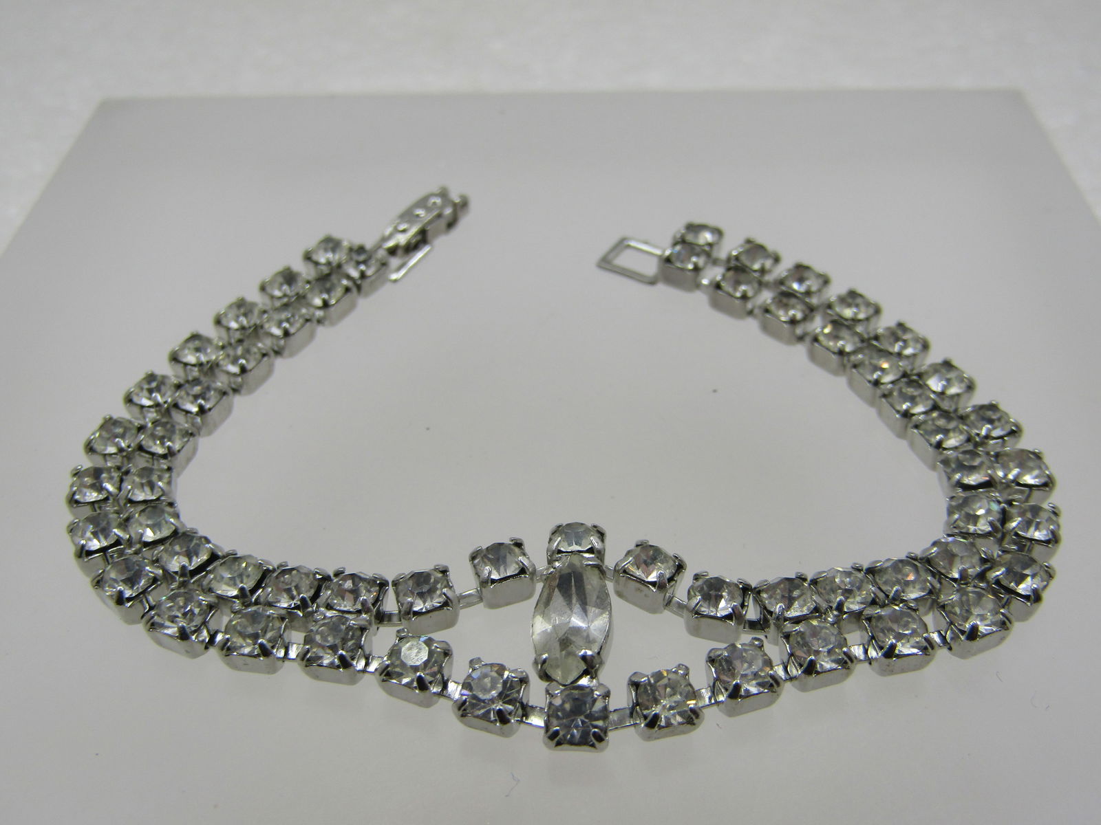 Vintage Rhinestone Double Strand Bracelet, 7", 3/4" Wide, 1940's-1960's: Title: Vintage Rhinestone Double Strand Bracelet, 7", 3/4" Wide, 1940's-1960's Description: Vintage Rhinestone Double Strand Bracelet, 7", 3/4" Wide. This has a double strand of rounds tones mounted i