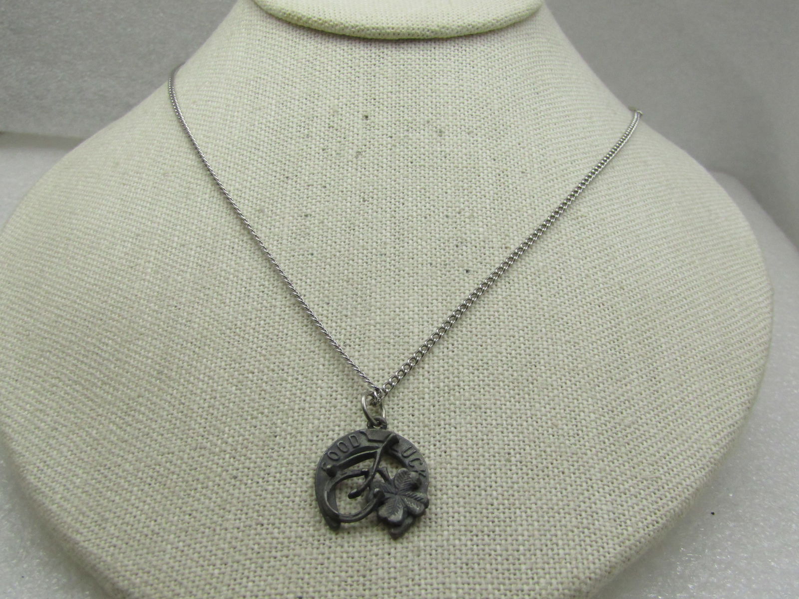 Vintage Good Luck Horseshoe , Clover Necklace, 18", 1950's-1960's: Title: Vintage Good Luck Horseshoe , Clover Necklace, 18", 1950's-1960's Description: Vintage Good Luck Horseshoe , Clover Necklace, 18", 1950's-1960's. this has an 18" silver tone 1.5mm curv link cha