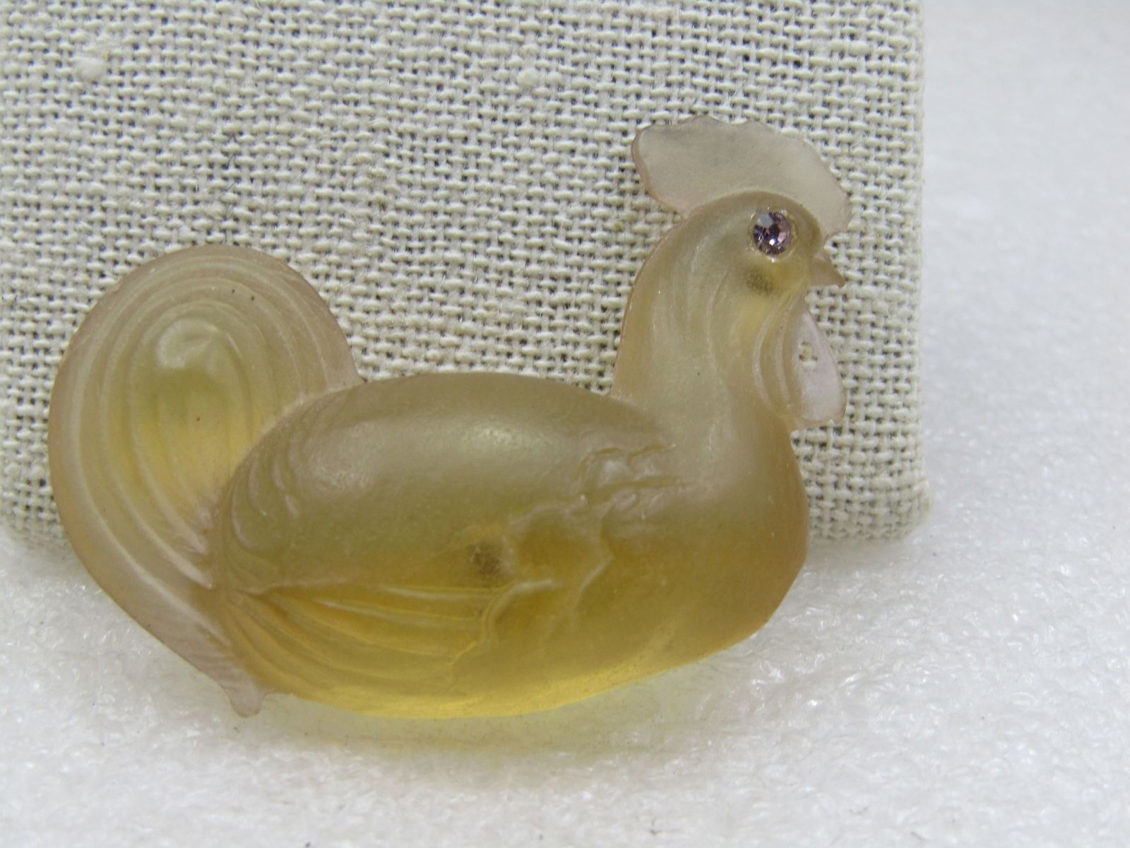 Vintage Pale Yellow Resting Rooster Brooch Rhinestone Eyes, 2": Title: Vintage Pale Yellow Resting Rooster Brooch Rhinestone Eyes, 2" Description: Vintage Pale Yellow Rooster Brooch Rhinestone Eyes, 2" wide and nearly 1.5" tall. The rooster is in a resting