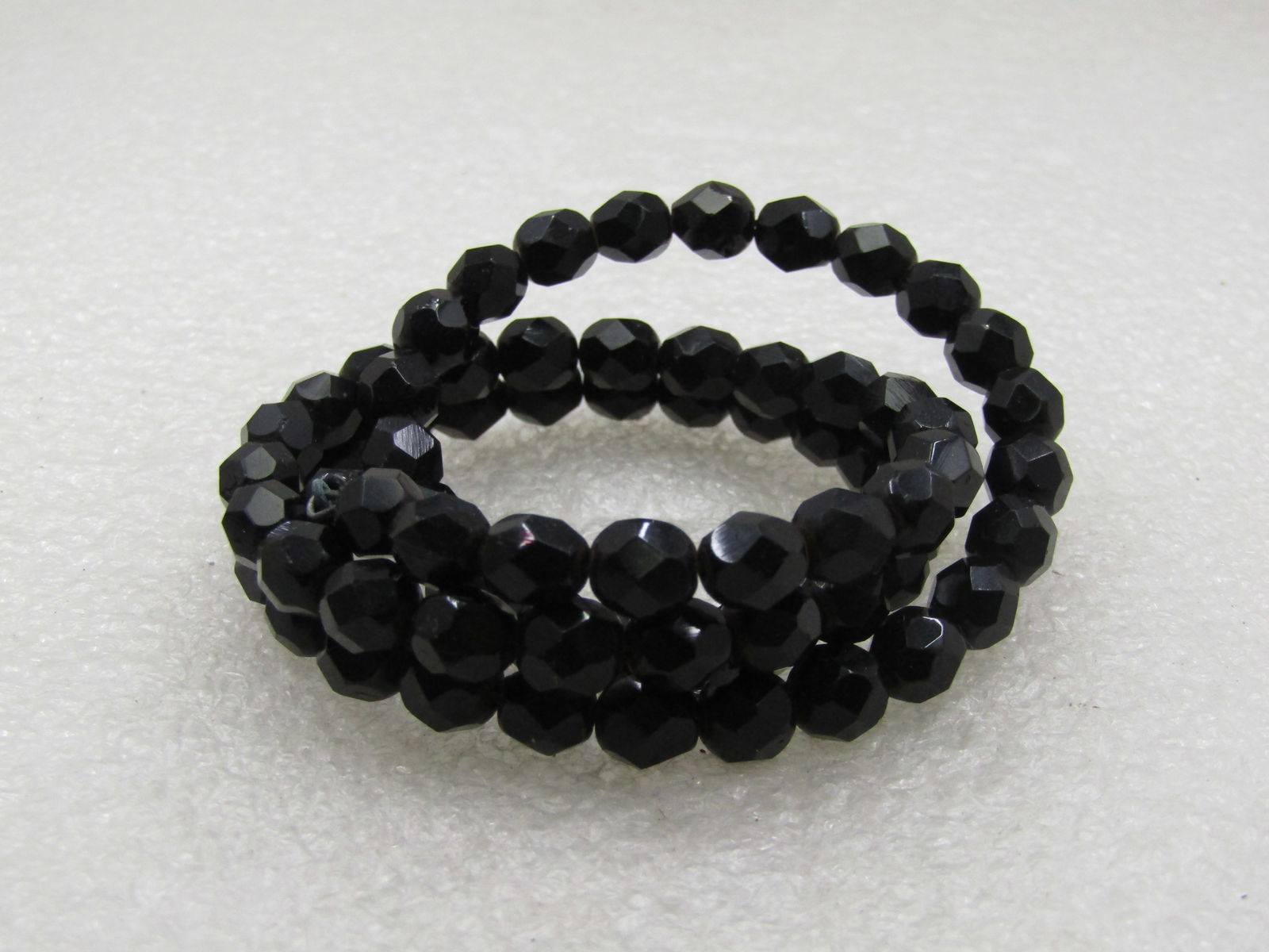 Vintage Black Faceted Glass Coiled Bracelet, Up to 7.5" (1 of 5)