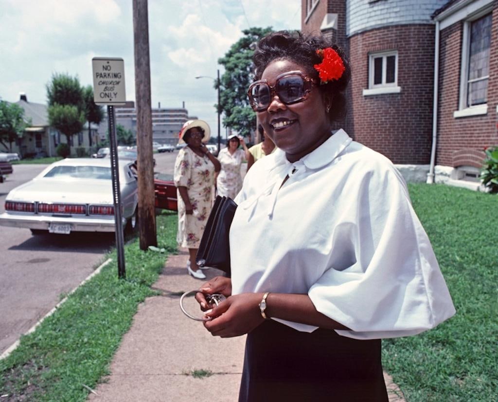Sunny St Louis by Alain Le Garsmeur: 1979 (printed later): Title: Sunny St Louis by Alain Le Garsmeur: 1979 (printed later) Description: Sunny St Louis by Alain Le Garsmeur A fashionable African American church member poses with sunglasses for the camera as