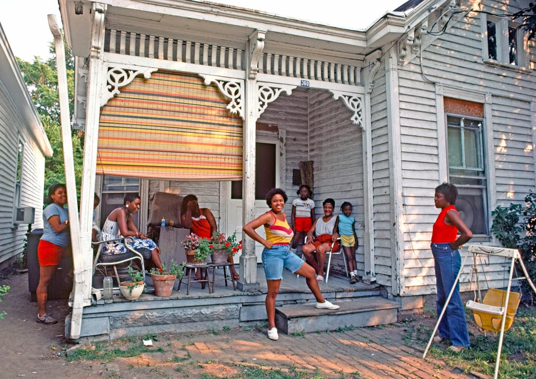 Happy Neighbours by Alain Le Garsmeur: 1984 (printed later): Title: Happy Neighbours by Alain Le Garsmeur: 1984 (printed later) Description: Happy Neighbours by Alain Le Garsmeur An African American family relaxing outside their house in downtown Lexington, Ken