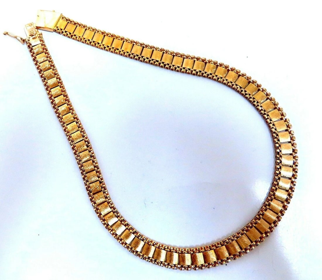 Reversible 5 Tier Curbed Band Link Gold Necklace 14kt gold 15 inch 9.8mm: Title: Reversible 5 Tier Curbed Band Link Gold Necklace 14kt gold 15 inch 9.8mm Description: Reversible 5 Tier Curbed Band Link Gold Necklace 14kt gold 15 inch 9.8mm $6,000.00 PRODUCT DESCRIPTION 