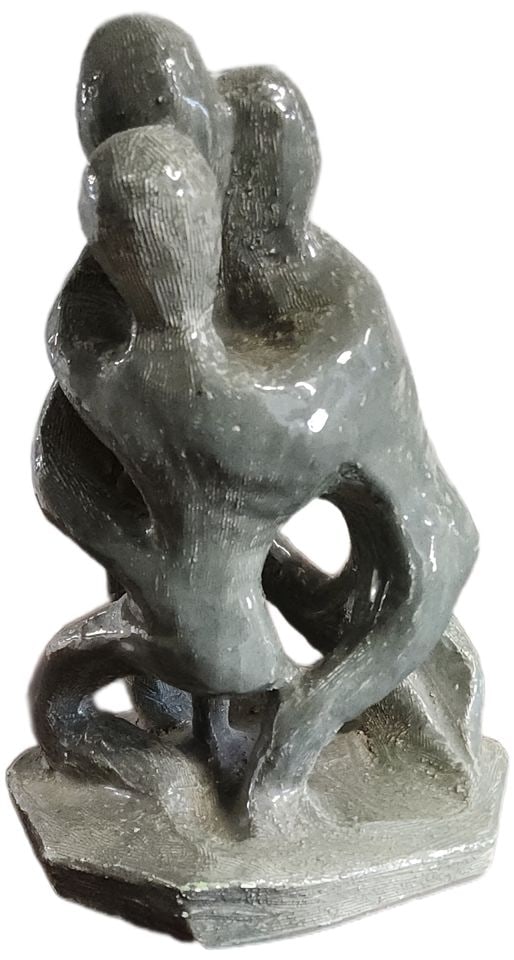 Vintage abstract ceramic ceramic sculpture depicting a warm embrace among three figures. 10h"x7d": Title: Vintage abstract ceramic ceramic sculpture depicting a warm embrace among three figures. 10h"x7d" Description: This compelling vintage abstract ceramic sculpture celebrates three embracing figu