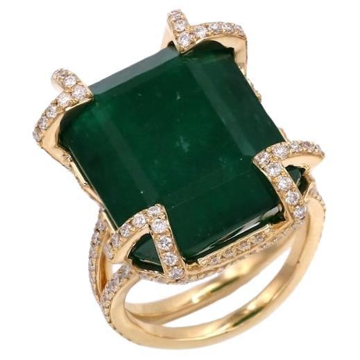 22.29 Ct Emerald Diamond 18K Yellow Gold Exclusive Ring: Title: 22.29 Ct Emerald Diamond 18K Yellow Gold Exclusive Ring Description: Ring 18K Yellow Gold Weight 10.43 GMS Emerald-1/22.29 Cts Round Diamond-210/1.494 Cts Size-54 This 18K Yellow Gold Ring, wei