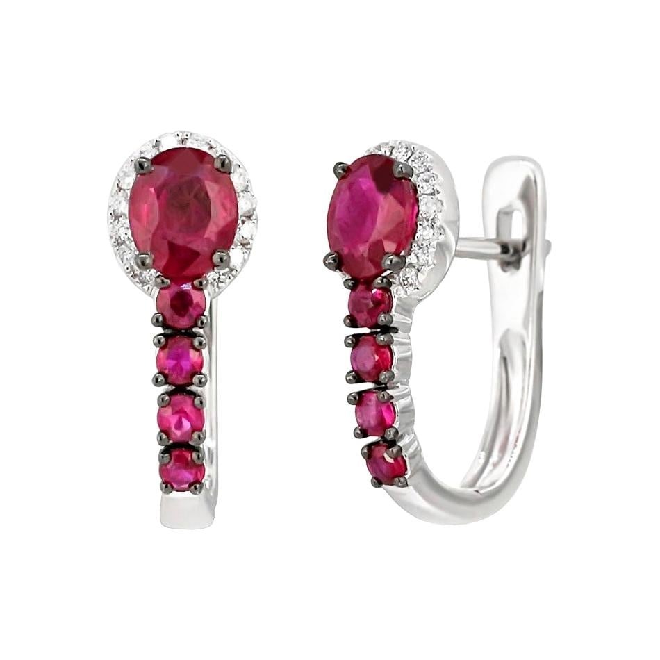 Fancy Ruby White Diamond White Gold Earrings: Title: Fancy Ruby White Diamond White Gold Earrings Description: White Gold 14K Earrings (Matching Ring Available) Diamond 32-RND-0,14-G/VS1A Ruby 10-2,76ct Diamond 40-RND-0,23-I/I1A Weight 3.02 grams