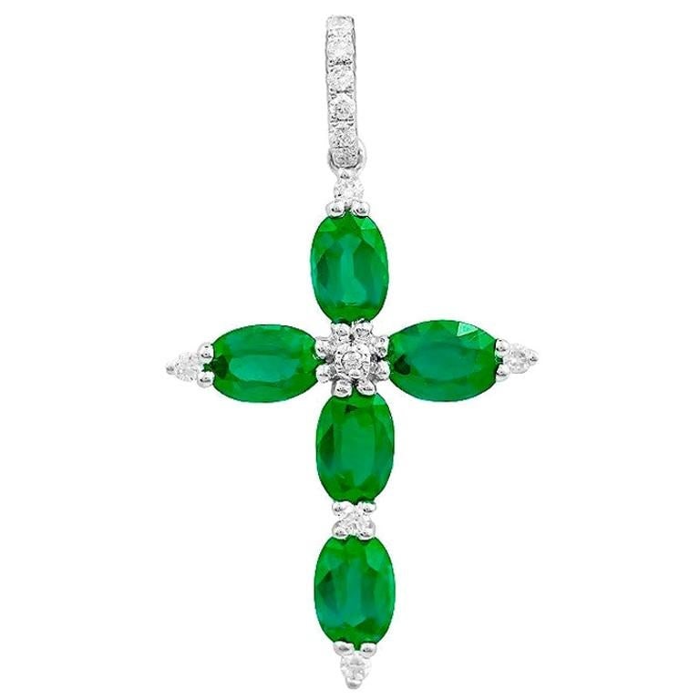 Impressive Rare Emerald Diamond White Gold Pendant Cross: Title: Impressive Rare Emerald Diamond White Gold Pendant Cross Description: Pendant White Gold 14 K Diamond 12-RND 57-0,14-G/SI1A Emerald 5-1,82ct Weight 2.07 grams With a heritage of ancient fine