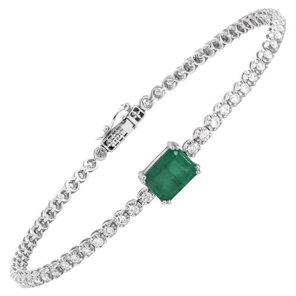 Magnificent Green Emerald Diamond Fine Jewellery White Gold Tennis Bracelet: Title: Magnificent Green Emerald Diamond Fine Jewellery White Gold Tennis Bracelet Description: Bracelet Gold 18 K Diamond D 0,92 ct Emerald EME 1,91 ct Length 18 cms With a heritage of ancient fine