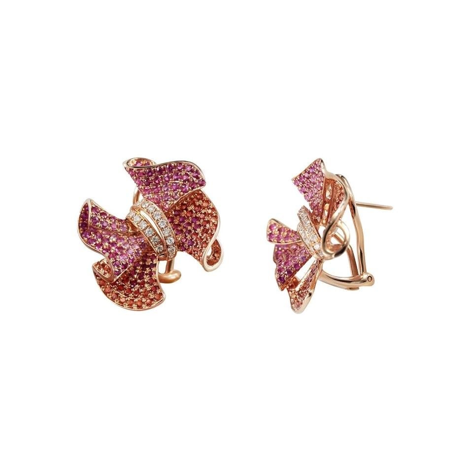 Rare Ruby Pink Sapphire White Diamond Flower Rose Gold Flower Earrings: Title: Rare Ruby Pink Sapphire White Diamond Flower Rose Gold Flower Earrings Description: Gold Earrings 14K Diamond 32-Round 57-0,25-4/6A Ruby 42-Round-0,43 ?(5)/2C Pink sapphire 140 Weight 10,42 gra