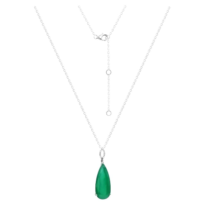 Posh Emerald Diamond 18K Gold Necklace Dangle for Her: Title: Posh Emerald Diamond 18K Gold Necklace Dangle for Her Description: RIng 18K White Gold Diamond 14-RD-0,38 ct Emerald 1-7,35 ct Weight 5,44 grams Size 45 cm With a heritage of ancient fine