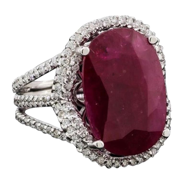 Fancy Impressive Natural Ruby Diamond White Gold Diamond Ring for Her: Title: Fancy Impressive Natural Ruby Diamond White Gold Diamond Ring for Her Description: 14KT white gold Ruby Diamond ring. Natural ruby 12.23ct (18.62 x 12.93 x 4.73mm). GIA Laboratory, Report #5172