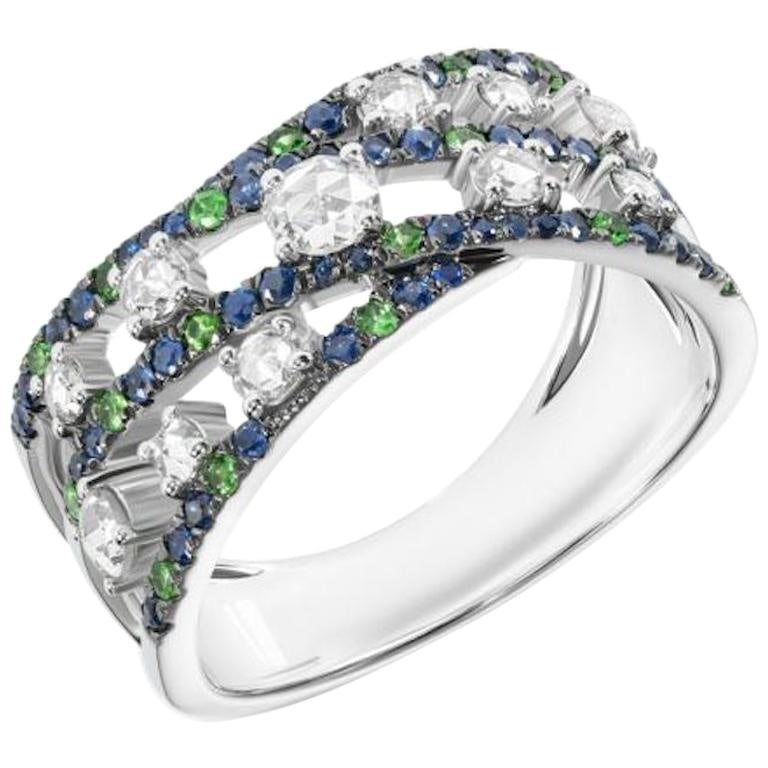 Original Natkina Blue Sapphire Tsavorite Diamond Ring for Her: Title: Original Natkina Blue Sapphire Tsavorite Diamond Ring for Her Description: Ring White Gold 14 K (Matching Earrings Available) Diamond 76-RND 57-0,47-4/6 Tsavorite Blue Sapphire Weight 5.68