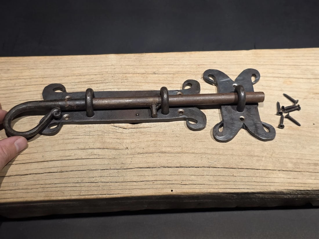 Pennsylvania German Slide Latch Hand Forged Primitive Iron: Title:Pennsylvania German Slide Latch Hand Forged Primitive IronDescription:Pennsylvania German "Ram’s Horn" Slide Latch | Hand-Forged Primitive Iron This is a museum-quality reproduction of