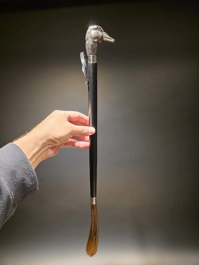 22" Nickel Plated Duck Head Shoehorn: Title:22" Nickel Plated Duck Head Shoehorn Description:Vintage-Style Shoehorn with Nickel Duck Handle – 22" This vintage-style shoehorn features a nickel-plated duck head handle, accented with a