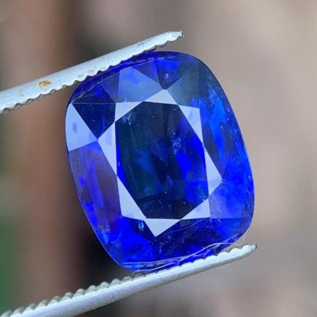 Royal Blue Sapphire Heated Cushion Cut Gemstone From Sri Lanka, 4.65 Ct: Title: Royal Blue Sapphire Heated Cushion Cut Gemstone From Sri Lanka, 4.65 CtDescription: " Supplies for making crafts Materials: Gemstone: Sapphire Carat weight: 4.65 Sapphire Details: