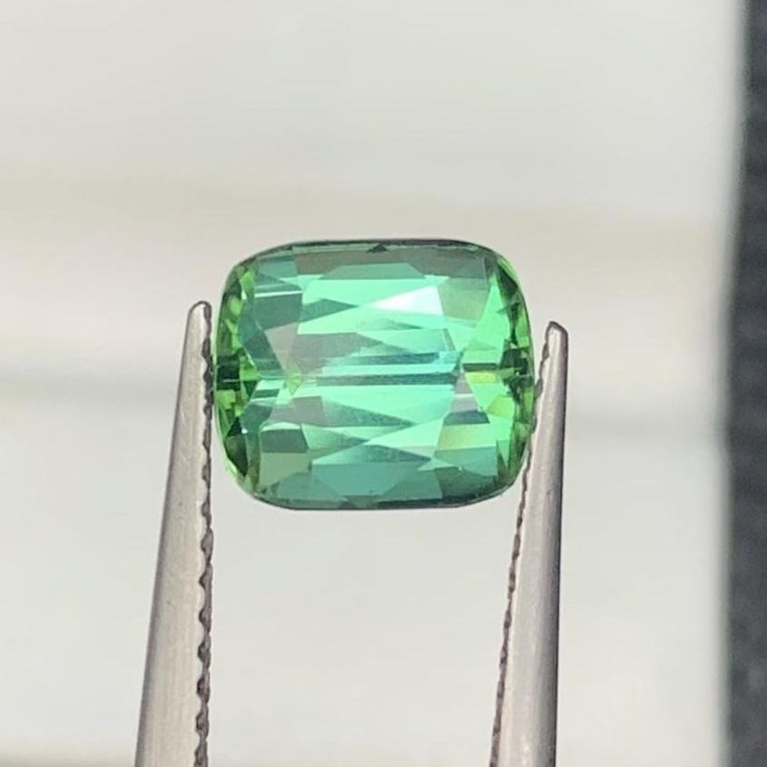 Mint Green Tourmaline Gemstone: 2.30 Carat Cushion Cut: Title: Mint Green Tourmaline Gemstone: 2.30 Carat Cushion CutDescription: Supplies for making crafts Materials: Gemstone: Tourmaline Carat weight: 2.30 Gemology: • Weight : 2.30 Carats 