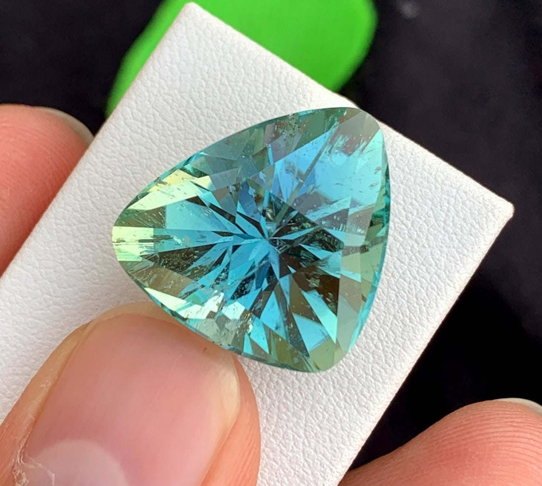 Green Kunzite Gemstone: 32.70 Carat Trillion Cut November Birthstone: Title: Green Kunzite Gemstone: 32.70 Carat Trillion Cut November BirthstoneDescription: Supplies for making crafts Materials: Gemstone: Kunzite Carat weight: 32.70 