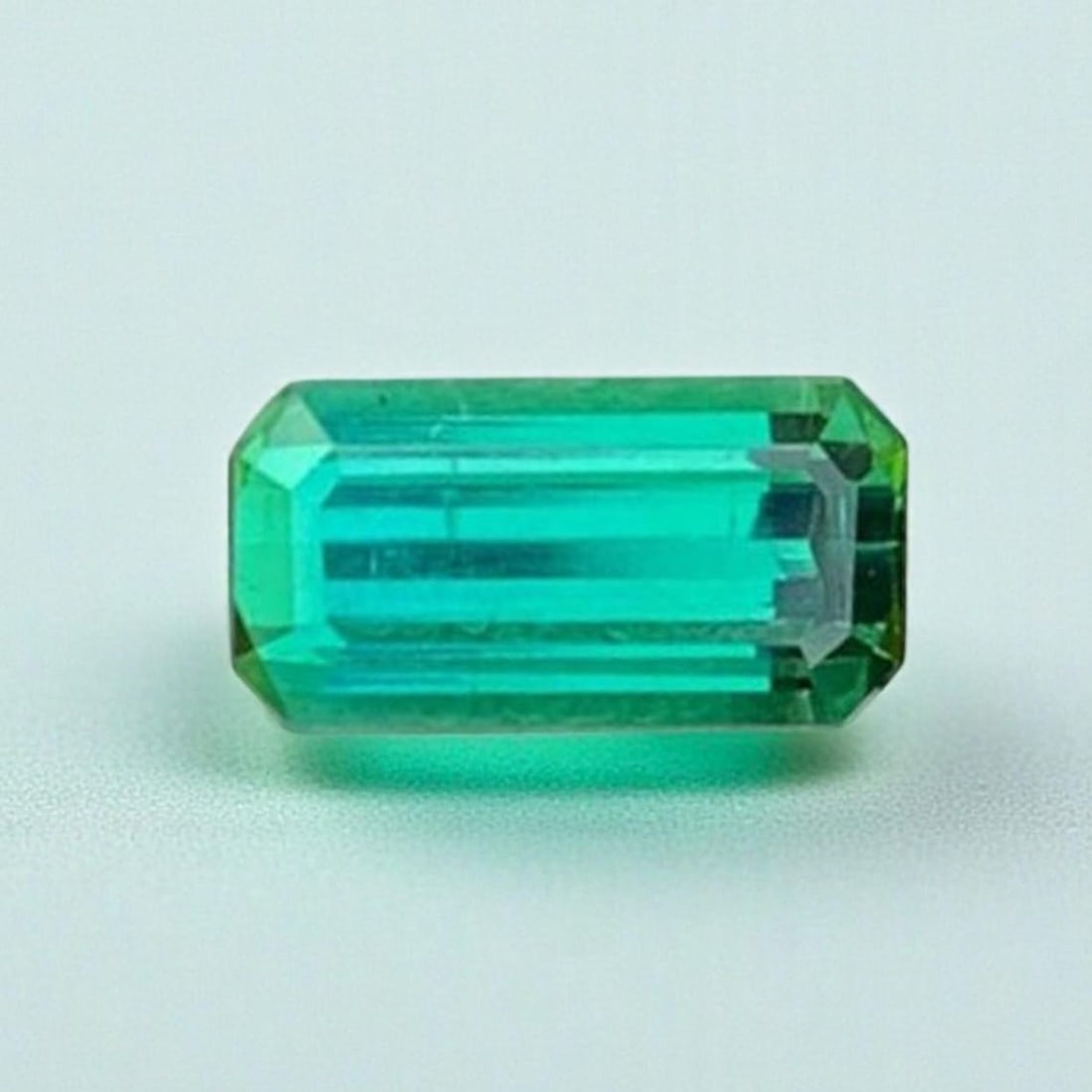 Blue Green Tourmaline Gemstone: Emerald Cut, October Birthstone (1.16 CT): Title: Blue Green Tourmaline Gemstone: Emerald Cut, October Birthstone (1.16 CT)Description: Supplies for making crafts Materials: Gemstone: Tourmaline Carat weight: 1.16 