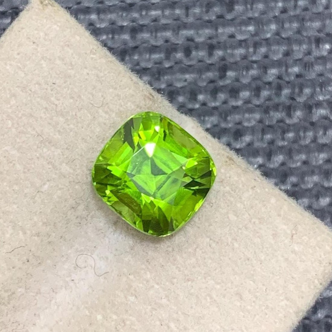 Apple Green Peridot Gemstone: 3.90 Carat Cushion Cut, Sapat Mine: Title: Apple Green Peridot Gemstone: 3.90 Carat Cushion Cut, Sapat Mine Description: Supplies for making crafts Materials: Gemstone: Peridot Carat weight: 3.90 Gemology: • Weight : 3.90 carat &#