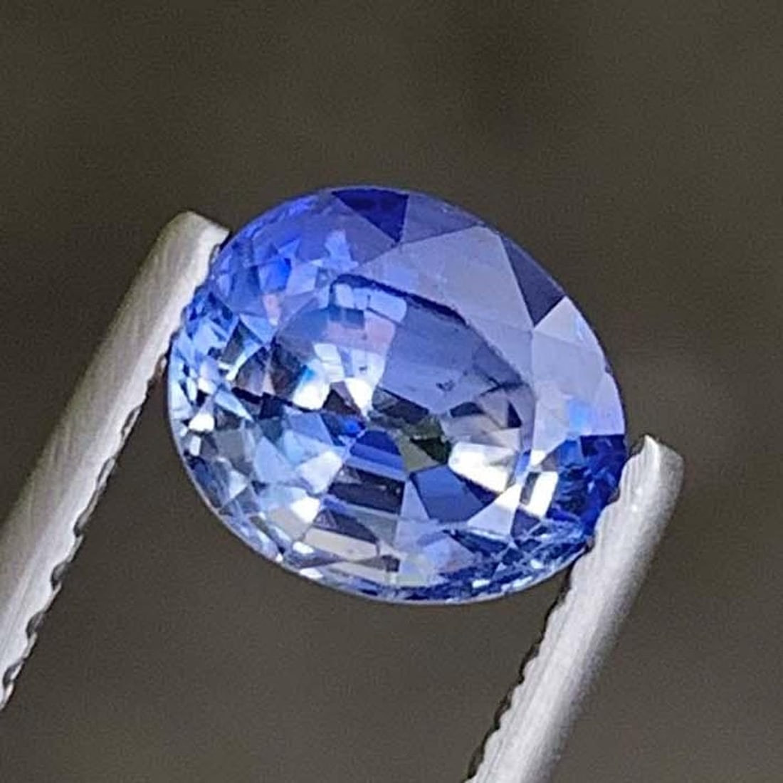 AIG Certified Faceted Blue Sapphire: 1.86 Carat Bi Color Oval Cut Gemstone (1 of 11)