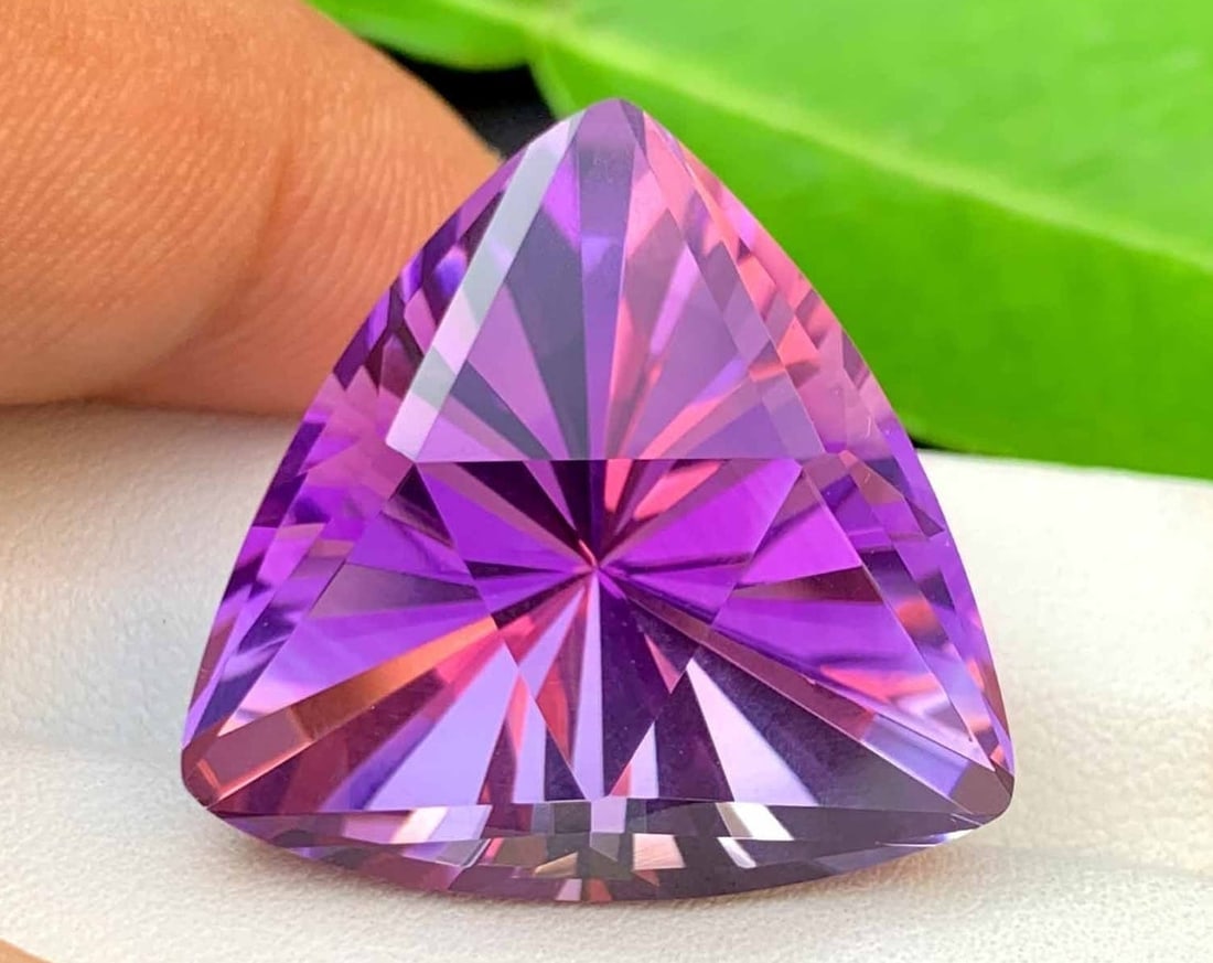 Blader Trillion Cut Amethyst Gemstone: 37.05 Carats, February Birthstone: Title: Blader Trillion Cut Amethyst Gemstone: 37.05 Carats, February Birthstone Description: Supplies for making crafts Materials: Gemstone: Amethyst Carat weight: 37.05