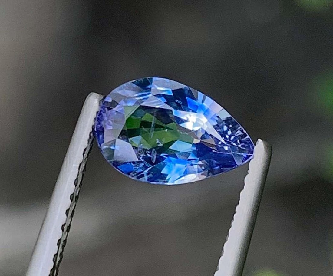 AIG Certified Faceted Blue Sapphire: 1.33 Carat Pear Cut Gemstone: Title: AIG Certified Faceted Blue Sapphire: 1.33 Carat Pear Cut Gemstone Description: Supplies for making crafts Materials: Gemstone: Sapphire AIG Certified Natural Sap