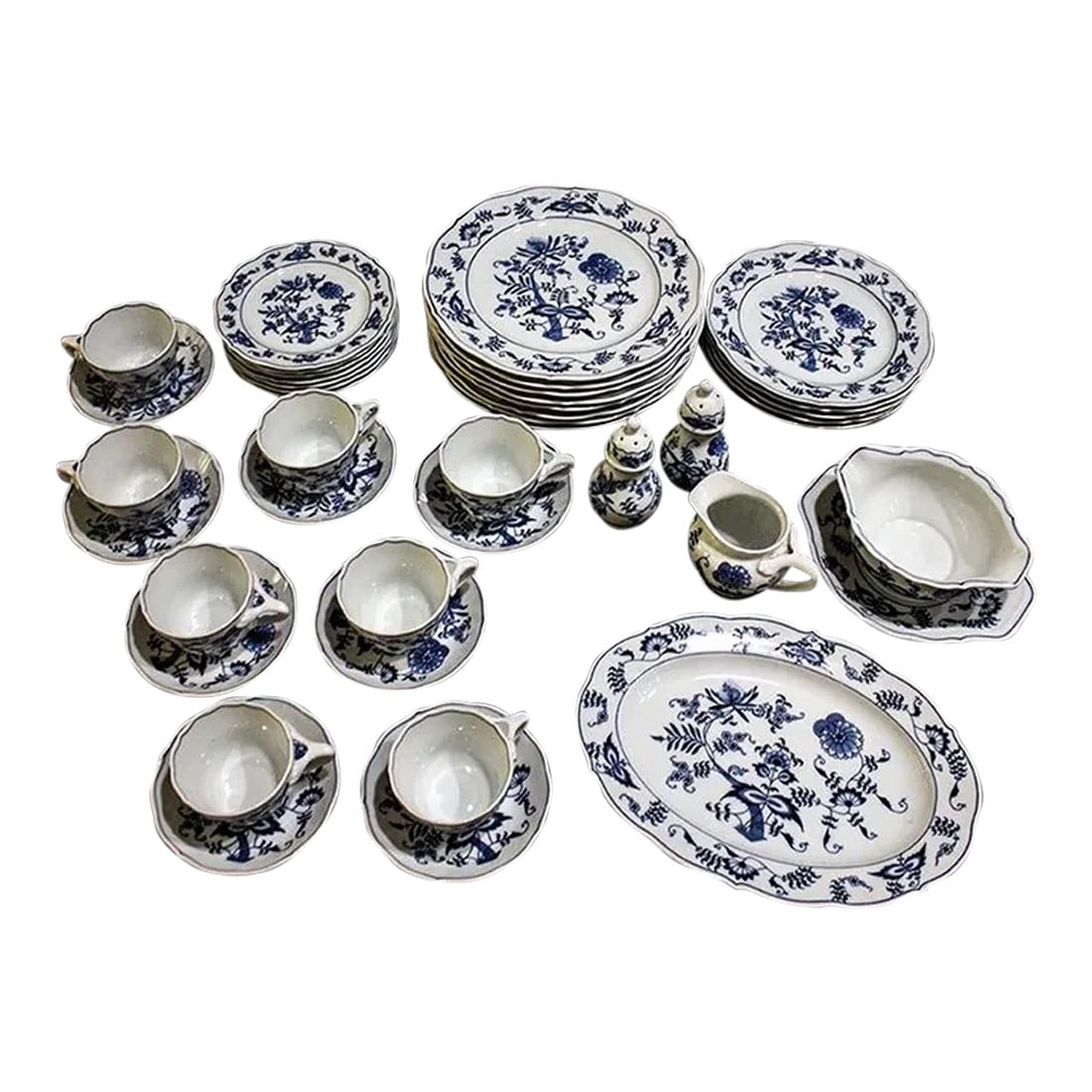 1970s Blue Danube Blue Onion China Service for 8 Plus Serving Pieces: 42 piece set of classic Blue Danube Blue Onion pattern china. Blue Danube was manufactured in Japan & sold in Europe & the U..S. The Blue Danube in a banner back-stamp was used from 1951 through 1976.