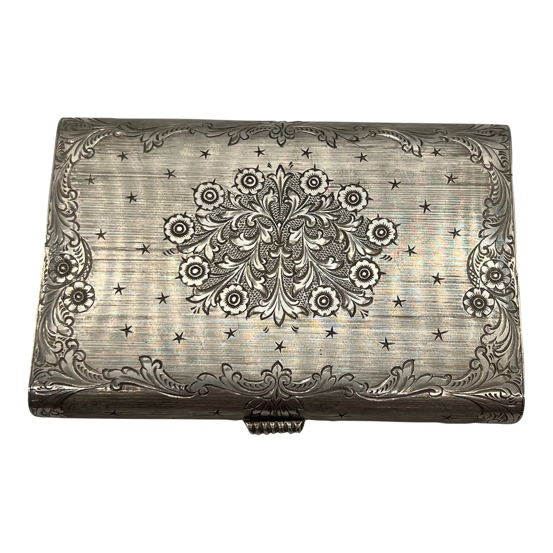 Antique Italian 800 Hand Chased Silver & Ruby Inset Minaudière Vanity Case: Italian, 20th century. A beautiful Italian 800 silver miniadiere or makeup compact case. The case has rubies inset to the top which accents the hand chased floral decoration. The sides and verso also