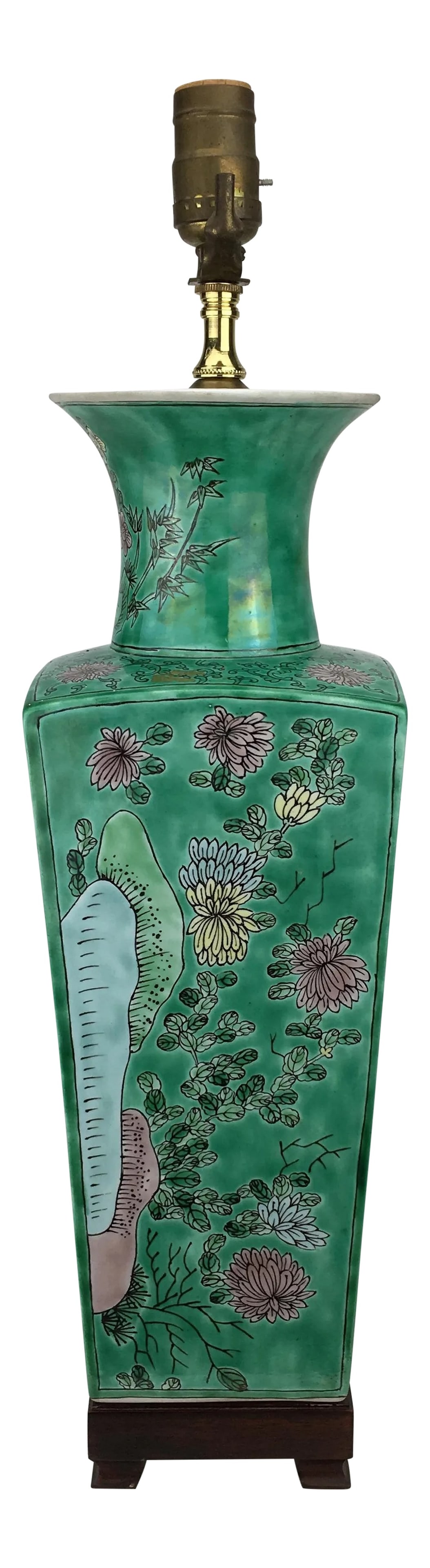 1970s Vintage Vase Lamp With Lotus Flowers: Elegant and stylish in a rich shade of green, this reading room vase lamp features lotus flower designs along the face of the lamp. Condition: Alterations: Original Condition Unaltered