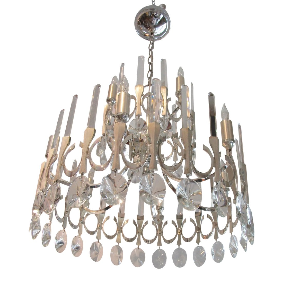 Sciolari Two Tiered Silver Plate and Crystal Chandelier Circa 1960's: Sciolari Two Tiered Silver Plate and Crystal Chandelier circa 1960's The chandelier has two tiers with 9 candelabra sockets. The frame has a brushed and polished silver finish. It has all original