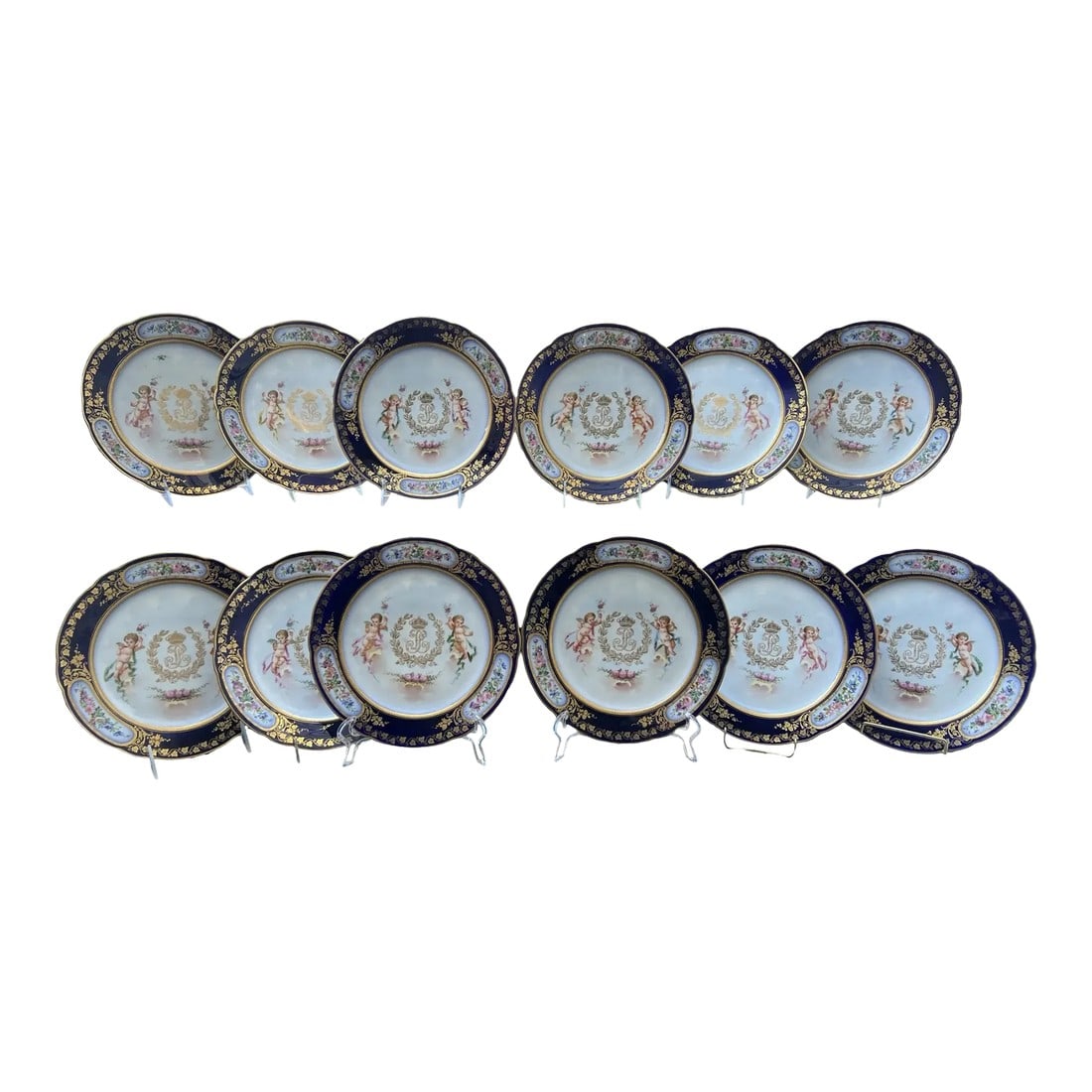 Set of 12, Sevres 19th C., Chateau Des Tuileries 1846 Louis Phillippe Plates: Sevres, Set of 12 Circa 1846. Made for the Chateau Des Tuileries service of Louis Phillippe. This exquisite 19th-century porcelain plate set, crafted by the renowned Sèvres manufactory,