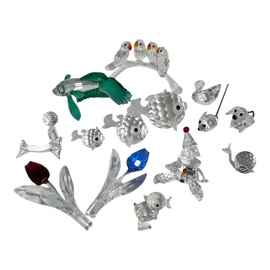 80s Swarovski Crystal Menagerie, Collection of 14: A collection of 70s and 80s retired Swarovski crystal decorative accessories, 14 pieces in all. No imperfections noted. Seal from the "Gift of Light" collection: 1.75" L x 1" D x 1.75" H Swarovski