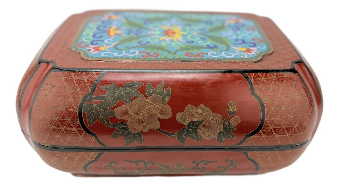 Chinese Cloisonne Mounted Red & Black Lacquer Box: This is a beautifully crafted lacquer box with a cloisonné enamel mount, featuring an intricate design that combines traditional craftsmanship with vibrant artistry. The lid showcases a richly