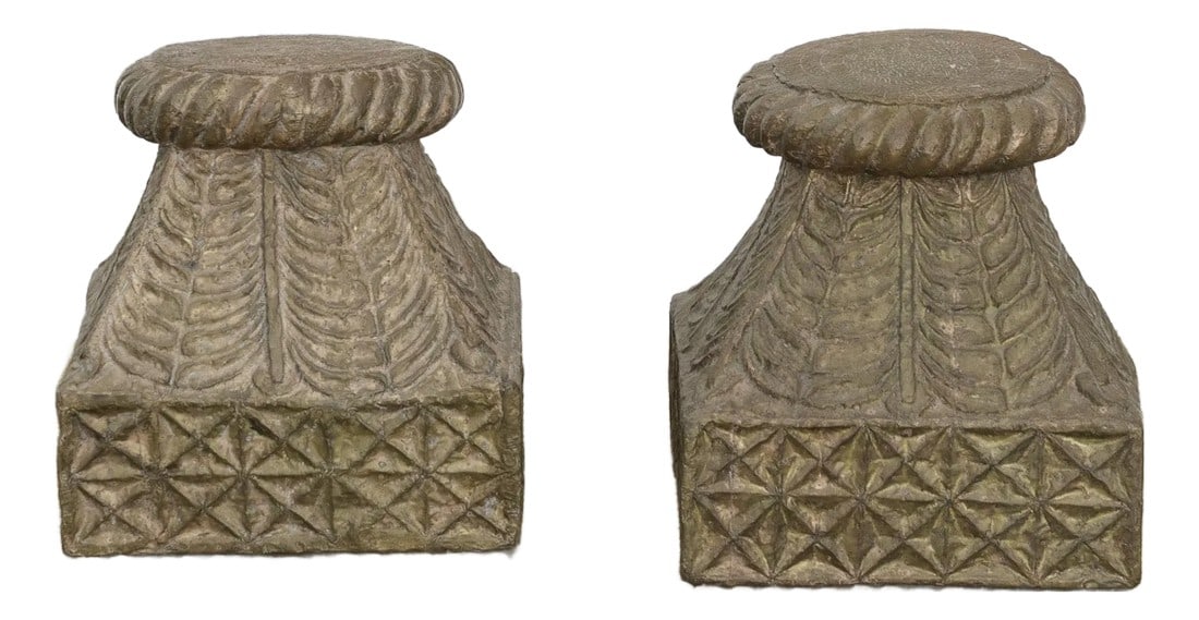 Pair of Antique Indian Pedestals With Engraved Metal: A magnificent pair of antique column bases, each standing at a versatile 16 inches in height. Crafted from solid wood, these robust pieces are beautifully adorned with decorative engraved patinated