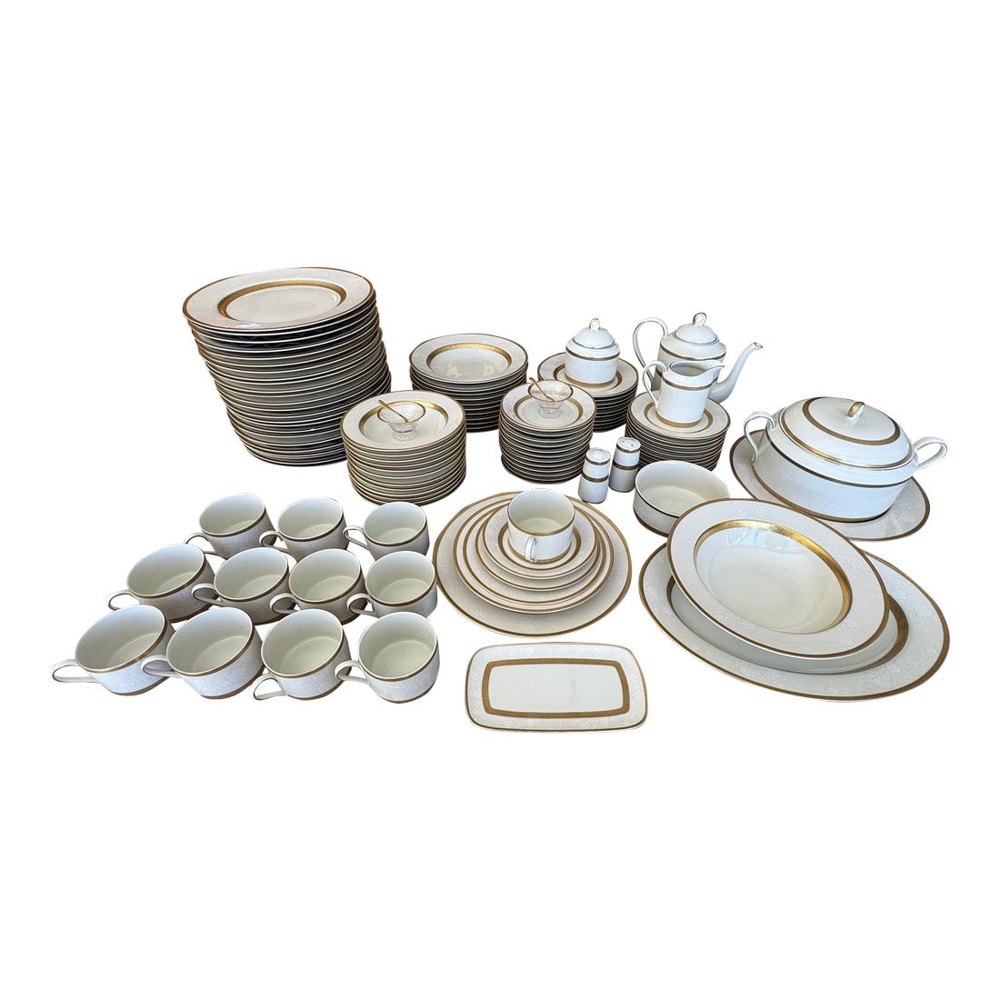 Late 20th Century Mikasa Antique Lace Fine China 6 Piece Place Setting - 85 Pieces: Bring refined elegance to your table with Mikasa's "Antique Lace" fine China, crafted in the late 20th century. This timeless pattern features a delicate lace-inspired border in soft ivory, accented w