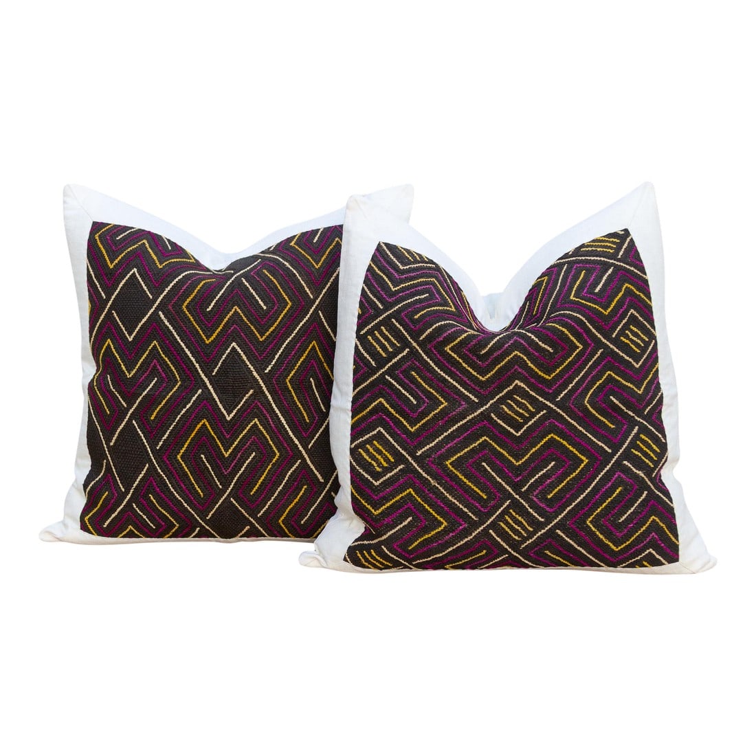 Ancestral Maze, Pair of Large African Kuba Cloth Pillows: This magnificent pair of decorative pillows is a celebration of complex, abstract geometry and ancestral tradition. Each large 24-inch square pillow is crafted from genuine vintage African Kuba Cloth,