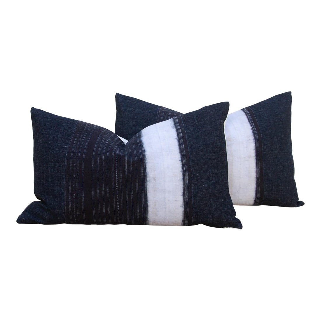 Indigo & White Vintage Hmong Lumbar Pillows, Pair: This compelling pair of decorative pillows is a powerful masterpiece of abstract contrast. Each 16 x 24-inch lumbar pillow is crafted from genuine vintage Southeast Asian textile, a luxurious hand-loo