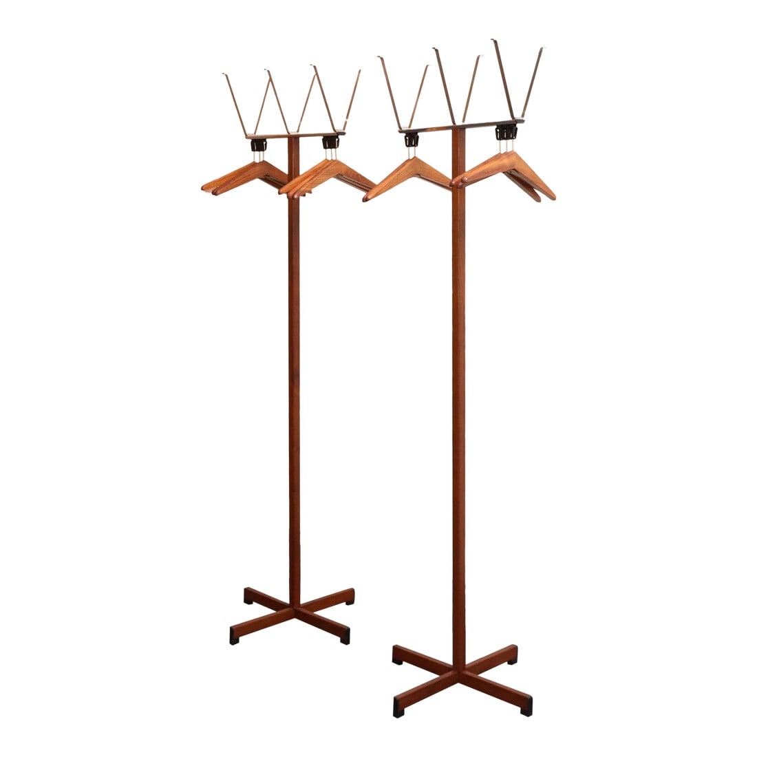 Pair of Modernist Chrome and Walnut Coat and Hat Trees / Racks by Vogel Peterson: Pair of Mid-Century Modern coat/hat trees manufactured by Vogel-Peterson (ca. 1960s, Illinois, USA). One rack/tree is equipped with five removable walnut hangers; the other has six, and both racks fea
