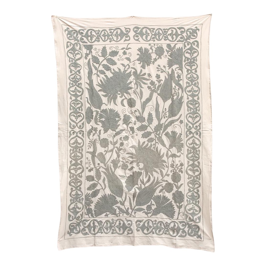 Exquisite Pearl Tone Hand-Embroidered Suzani Throw: This exceptional textile is an authentic Suzani (suzan means "needle") from Central Asia, distinguished by its subtle yet powerful monochromatic tonal embroidery. The fine silk thread color"”a