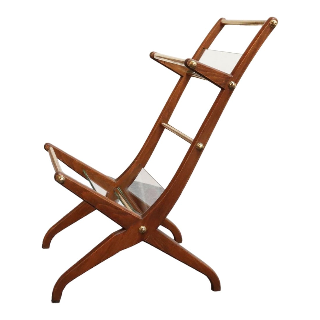 Italian Modernist Sculptural Walnut, Brass and Glass Magazine Rack / Stand: Architectural two-tiered magazine/book/periodical stand/rack/table (ca. 1950s, Italy). Composed of a deeply sculpted Italian Walnut frame supporting tubular brass rails with exposed brass hardware