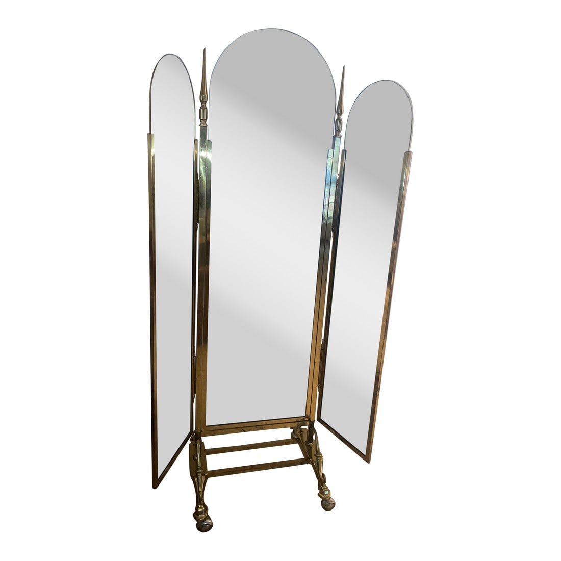 Large Brass Tri Fold Floor Mirror: Striking large functional 3 way floor mirror on casters having eye catching finials and elegant details along its base and hinges. 34 w or 46.5 w with sides outstretched (MD) Condition:
